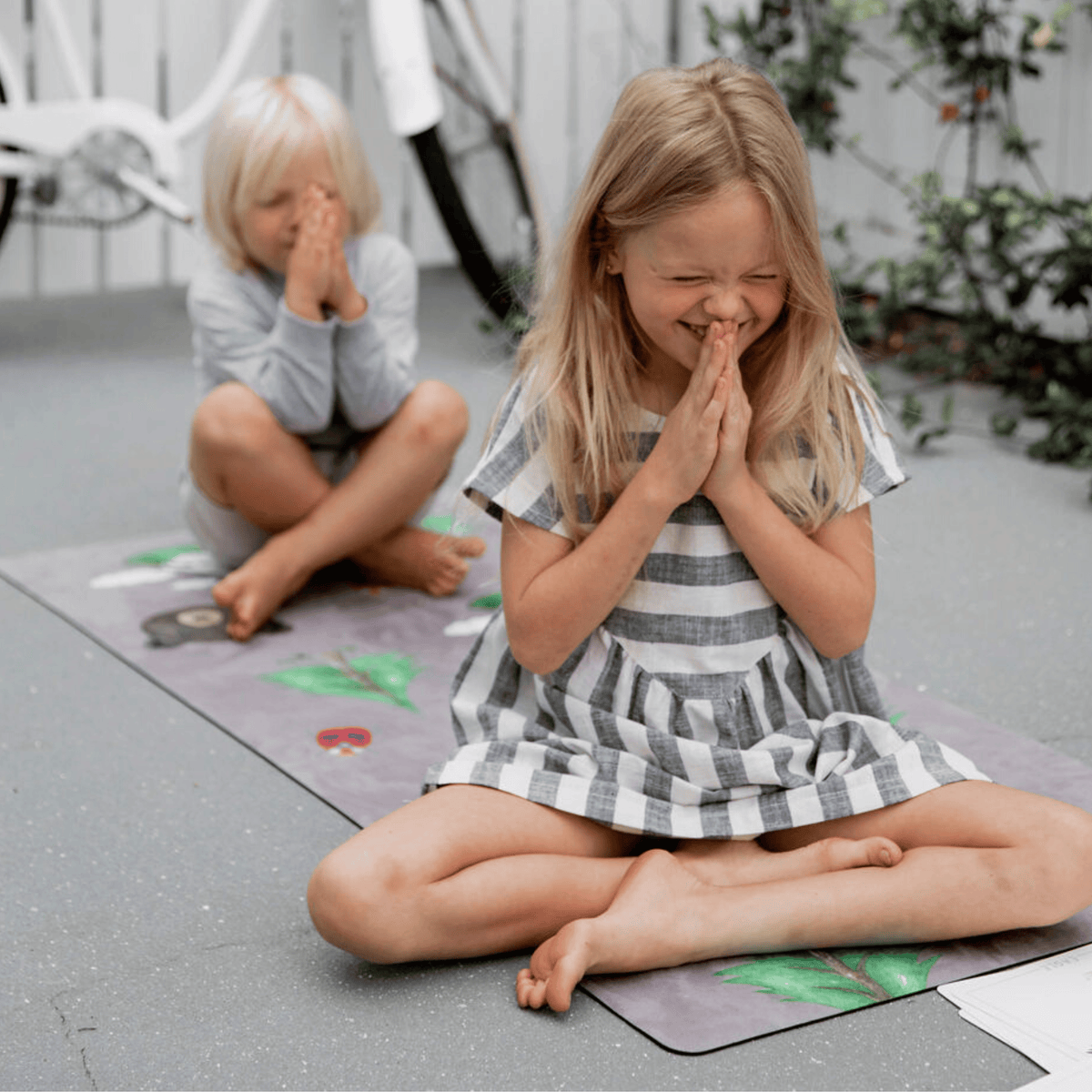 kids yoga on mat